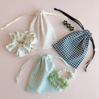 アクセサリーと巾着を春っぽくリンクさせて。　“１００円で暮らしは楽しくなる“