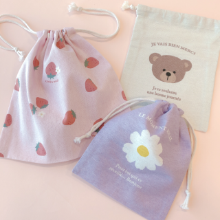 コットン生地がいい感じの小さめサイズ巾着です。　“１００円で暮らしは楽しくなる“