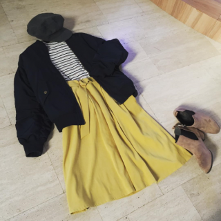 ブルゾンをスカート合わせにするときは後ろ下がりに着て着丈を短く見せるのがバランスアップの秘訣！